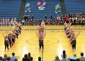 photo by Carolyn Bertsch The 'Kickettes', from grades 5-6, performed the song "Hawaiian Roller Coaster" at the Sartell-St. Stephen Community Education Dance Show on April 18. 200 dancers, ranging from preschool to high school seniors performed several routines including a light show.