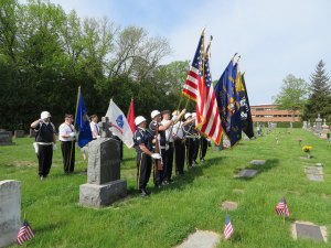 photo by Cori Hilsgen The Honor Guard prepares for services on Memorial Day in the old St. Joseph cemetery. 