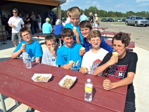 photo by Dennis Dalman Baseball buddies, all Sartell residents, enjoy ice-cream cones on a hot day at the grand opening May 30 of Pinecone Central Park. The friends gave rave reviews to the playing fields at the new park. From left to right (front row) are Dalton Notsch, Logan Carlson, Matt Sieben, Max Fesenmaier and Gage Vierzba; (back row) Gavin Swenson and Wesley Nesland. 