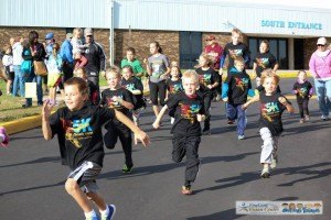 contributed photo Children set out on the Back to School 5k Run at Sartell Middle School during the event in 2013. The event raises funds for the Early Childhood Education Center. 