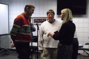 photo by Logan Gruber Emily Jensen, DFL candidate for Minnesota House District 13A and College of St. Benedict senior, speaks with area residents after the forum.