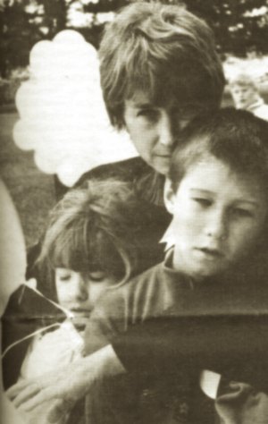 photo by Stuart Goldschen Patty Wetterling hugs her two youngest children Trevor (10) and Carmen (8) during a recent balloon release held for Jacob Wetterling (11) abducted Oct. 22 near their home.