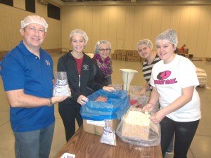 photo by Dennis Dalman Members of the TARGET Club from Sartell pack food bags at We Are Thankful, a massive food-packaging event Nov. 22 at River’s Edge Convention Center in St. Cloud. From left to right are Adam VandeVrede, co-leader of TARGET, Kateyln Stalboerger, Abagaile Filsmeyer, Kaitlyn Harner and Becca Kulla. At a nearby table were many other members of Sartell TARGET. 