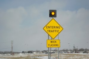 photo by Logan Gruber The new warning system indicates whether traffic is entering Highway 2 from Minnesota Street, and is visible for both north- and south-bound vehicles. 