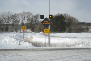 photo by Logan Gruber The new warning system indicates whether north- or south-bound traffic is heading towards Minnesota Street on Highway 2. 