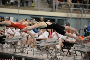 contributed photo Senior captain Jennifer Thompson of Sartell (foreground) starts her 100-yard freestyle race at the state swim meet. She and her teammates took second place in the tournament’s Class A category. 