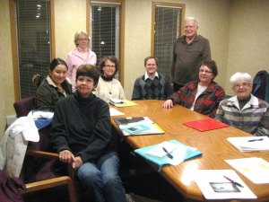 contributed photo Eight members of the Grand View Poets group, shown here at one of their monthly meetings, are (left to right, clockwise) Pat Fillmore, Sydney Lo, Kathy Wallin, Micki Blenkush, Dane Listug-Lunde, Dennis Herschbach, Cindy Stupnik and Mary Willette Hughes. 