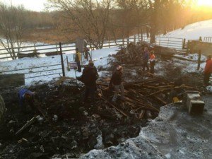 contributed photo Clean up after the fire was a tough affair, though family and friends turned out to assist.