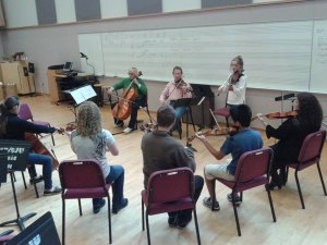 contributed photo Members of the overture masterclass practice at their St. John's/ St. Ben's rehearsal hall.