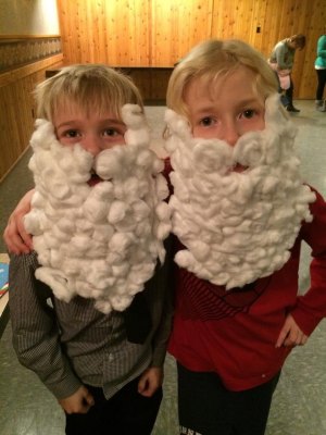 Ethan Lumming, 7, of Cold Spring and Oliver May, 7, of St. Cloud, were mimicking the guest of honor at Little Saints Academy's Holiday Social. Lumming and May attend Kennedy Elementary together.