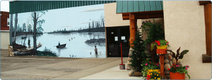 contributed photo A lifelike mural of anglers adorns the outside of the Minnesota Fishing Museum in Little Falls.
