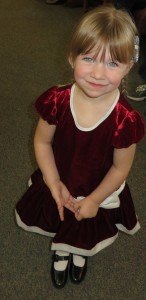 photo by Cori Hilsgen Cadence Hartwig,3, daughter of Angie and Jimmie Hartwig, was dressed in her holiday party dress. Angie Hartwig works as a home health aide at Arlington Place. 