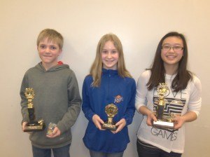 photo by Dennis Dalman The three winners of the Sartell Middle School Spelling Bee are (left to right) Ben Brandt, first-place champion; Nora Steil, third place; and Elaine Lo, second place.