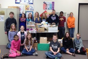 contributed photo Sartell Middle School staff and students have collected more than 2,500 books to donate during the last several months as part of the WE DAY initiative. Pictured are SMS Student Council members: Summbla Anjum, Becca Ringstad, Hannah Hackenmueller, Nora Steil, Alice Colatrella, Bailey Guggisberg, Lauren Lindmeier, Marissa Kouba, Drake Lalim, Janagan Ramanathan, Faith Kowalke, Charlie Magnuson, Bryson Morrison, Carter Bright and Hannah Lalim. Books For Africa collects, sorts, ships and distributes books to students of all ages in Africa. Their goal is to end the book famine in Africa. Books For Africa remains the largest shipper of donated text and library books to the African continent, shipping more than 31 million books to 49 different countries since 1988.