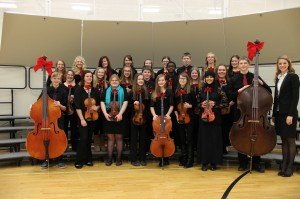 contributed photo The Kennedy Community School seventh- and eighth-grade orchestra is pictured with directors of orchestras Kimberly Fahy. 