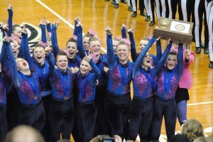 contributed photo Sartell Sabre dancers hoist high their award after winning the high-kick championship at Target Center Feb. 14.