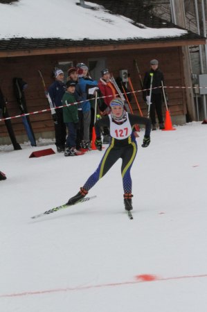 photo by David Eickhoff Lauren Bucholz raced down the trail Feb. 3 at the section meet. 