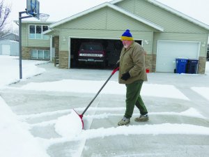 photo by Logan Gruber The snow returned on Feb. 3, and while it wasn't exactly welcome, it seemed to be expected. Tom McCall, of the Northland neighborhood, was shoveling his driveway Tuesday afternoon, and seemed to be enjoying himself. McCall has lived in St. Joseph for about 8 years. He's originally from the St. Cloud area, but moved away for a time to Texas. "This is the first January since we moved back up here that we've had barely any snow," McCall said.