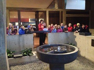 contributed photo Students from St. Francis Xavier School in Sartell listened while a tour guide explained the meaning of the fountain as they entered the church. 