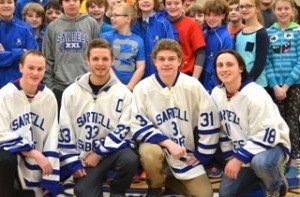 contributed photo Four Sartell High School members of the Fellowship of Christian Athletes recently spent time with Sartell Middle School students. From left to right are Alec Adelman, junior; Carter Kasianov, senior, Keenan Lund, junior and JJ Lund, senior.  