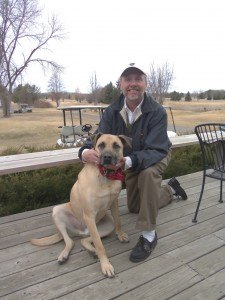 photo by Dennis Dalman Jeff Westerlund, the new manager of Pine Ridge Golf Course in Sartell, owns a prized pooch, Marley, who is the mascot of the course. The yellow lab/German sherpherd cross is a dog that Westerlund cared for as a foster parent for the Tri-County Humane Society and then decided to keep. The inseparable buddies like to wander the golf course, where Harley often scares away geese who have a penchant for leaving their “deposits” on the course, Westerlund noted.  