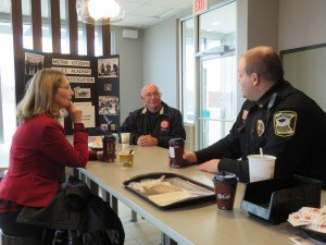 photo by Logan Gruber From left to right, Karen Miller, Fred Hinkle and Police Chief Joel Klein chatted over coffee and other drinks at McDonald's March 26. Two area residents, Mary Ann and Jim Graeve, were also in attendance.