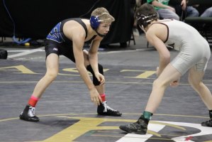 contributed photo Rylee Molitor, left, was matched up against Tyler Eischens of Anoka in the state final, in section AAA on Feb. 28. Before facing off against and eventually defeating Eischens, Molitor defeated individual wrestlers from Rosemount,  Farmington and Prior Lake in the 113-pound weight class. Molitor is a 10th grader, and is the first individual state wrestling champion in Sartell history. The first season of competitive wrestling in Sartell was the 1969-70 season.