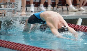 photo by Bre McGee Sartell sophomore Mitchell Dockendorf swims the first part of the 200 yard medley relay of the boys' swimming and diving state tournament Saturday at the University of Minnesota's Aquatic Center. The team of Dockendorf, Jake Martin,  Chad Peichel and Zach Weiler finished in fifth place.