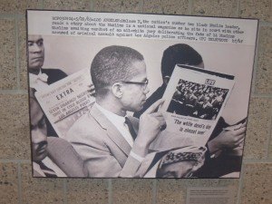 photo by Dennis Dalman This photograph shows Malcolm X, civil-rights militant, reading an account in LIFE magazine in 1963 while sitting in a courtroom during the trial of black Muslims accused of assaulting Los Angeles police officers. The jury was all-white. Malcolm X, who was assassinated, believed blacks could not remain passive to the assaults by whites against them.