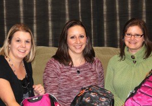 contributed photo Three Sartell women started a program called Pockets of Hope that gives comfort to children going through the sometimes traumatic experience of being placed in foster care. From left to right are Briana Sjodin, treasurer; Lisa Schroers, president; and Jennifer Bruzek, secretary.