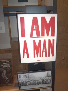 photo by Dennis Dalman This is a lithograph placard used in demonstrations following the assassination of Martin Luther King Jr. in 1968. The point of the message was that African-Americans were trying to remind others they are human beings, not aliens, animals or second-class citizens. This is one of many displays at a new exhibit at the Stearns History Museum, entitled "For All the World to See."