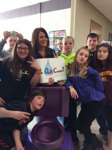 contributed photo The Sauk Rapids-Rice school district is participating in the annual Walk for Life May 1. One event students and staff at the Sauk Rapids-Rice Middle School participated in was the rolling purple toilet which visited sixth-grade teacher Chanda Larson's classroom.  Pictured are (third row, left to right) Elijah Woggon, Chanda Larson, Veronica Peacock, Ady Froiland, Logan Ludwig; (second row) Allison Stiegel, Anja Hanson, Dacia Douma; (front) Gage Henry. 