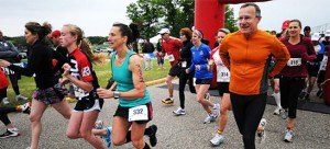 contributed photo At the 2014 Sartell Apple Duathlon, adult contenders dash off from the starting line. 