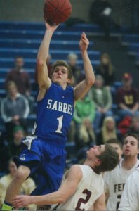 photo from Tom Bearson Foundation website Sartell Sabres basketball dynamo Tom Bearson makes another basket during a game several years ago.