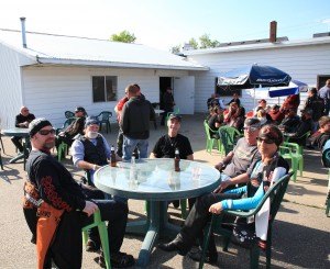 photo by Carolyn Bertsch Joe Hammes, Richmond, Wayne Volkers, St. Joseph, Randy Nuckolls (Cody's Grandfather), St. Cloud, Steve Vonwahlde, Pearl Lake and Kim Orth, St. Cloud enjoy a beverage at Trobec's Bar and Grill, the last stop at the Ride for Cody event.