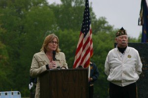 photo by Steven Wright State Senator Michelle Fischbach delivers her speech Monday at Sacred Heart Cemetery in Sauk Rapids.