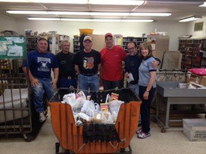 contributed photo The Stamp Out Hunger food drive, a team effort between local mail carriers, the Boy and Cub Scouts and St. Joseph residents, collected 2,660 pounds of food on May 9. Mail carriers, from left to right, are: Gary Athmann, Fred Holthaus, Tom Klein, Todd Ruegemer, Victor Medina and Barb Egerman.
