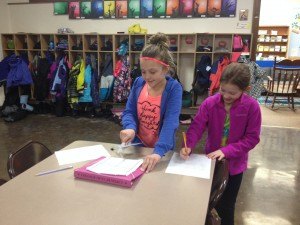 contributed photo Third-grade students Alexis Finken (left) and Gabriell Morris launch the glider they designed and built. They are testing ways to make the glider fly a greater distance. 