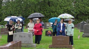 photo by Cori Hilsgen Members of the American Legion Post 328 Women's Auxiliary of St. Joseph listen as names of departed veterans are read. 