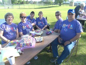 photo by Dennis Dalman At the Relay for Life rally June 5, a walking team named “Fightin’ Chicks” relaxes before beginning their relay walk. The team raised the third-highest amount of money at the event of the 27 teams – $4,004. It's comprised of (left to right) Judy Braegelmann of Waite Park, Jareet Kaproth of St. Cloud, Lori Zipp of Sauk Rapids, Sharon Skuza of Sauk Rapids, Doreen Unterberger of St. Cloud and Tom Skuza of Sauk Rapids. Sharon and Tom are married. Kaproth is Tom’s cousin, Braegleman is Tom’s sister-in-law, and Zipp is Tom’s younger sister. 