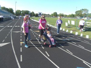 photo by Dennis Dalman Some of the fundraising walkers began early at the Relay for Life rally held in Sartell June 5-6. Walkers did relays all night long to raise funds for the American Cancer Society. 