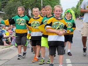 photo from River Days website Sauk Rapids boys, dressed up in their Sauk Rapids Storm jerseys, walk in last year’s Rapids River Fest Parade. There will be at least 85 units in this year’s parade, June 26. It will start at 6 p.m. 