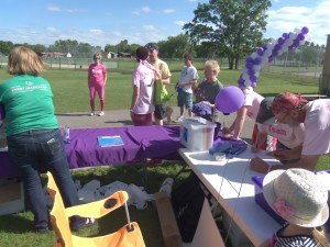 photo by Dennis Dalman Early-bird Relay for Life participants sign up as they enter the athletic facilities at Sartell Middle School Jan. 5.  