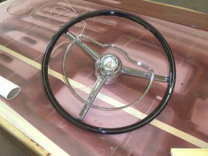 photo by Dennis Dalman The original steering wheel of the 1957 Chris Craft boat will soon be re-attached to the boat. 