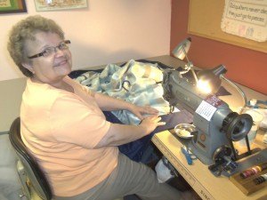 photo by Dennis Dalman Evelyn Kirchner has sewn so many quilts the thread would fit around the Earth many times over, most likely. She worked as a seamstress for many years at Stearns Manufacturing, and now she sews as many as seven hours some days sewing for "The Quilters," a group of quilters from Rice, Sauk Rapids and Sartell.