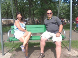 photo by Dennis Dalman Cheryl and Keith Redmond take a relaxing swing as they watch the river flow by during River Days Food Fest in Municipal Park, Sauk Rapids, June 27.