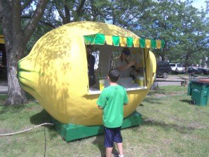 photo by Dennis Dalman Fresh lemonade cleverly dispensed from a lemon vending booth was a hit with visitors to River Days Food Fest in Sauk Rapids Municipal Park. 