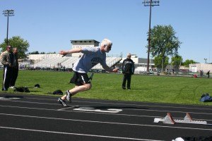 photo by Steven Wright Steve Briggs accelerates off the starting blocks during his 200 meter dash at Saturday's Senior Games.
