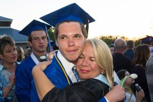 Matthew Jurek gets a hug from his mother, Stacey Jurek, after the ceremony.