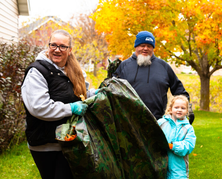 Helping hands clean yards